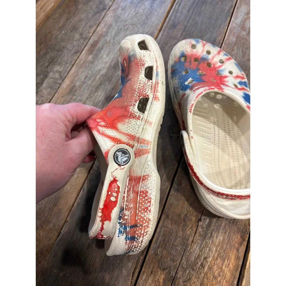 Crocs red, white and blue tie-dye slides